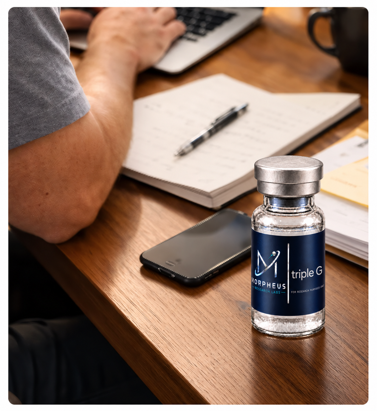 Morpheus Triple G bottle beside a work desk